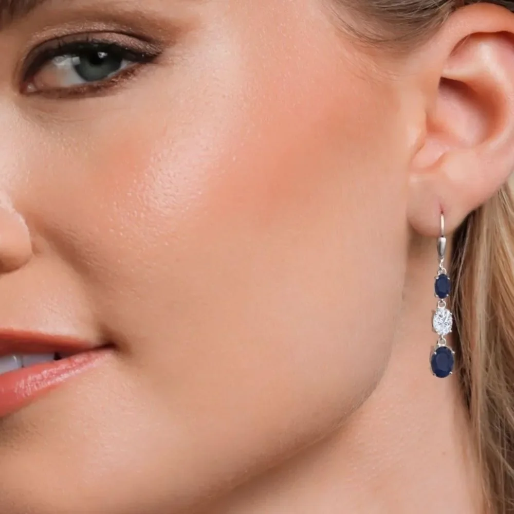 925 Sterling Silver with 6.51 Cttw 3 Stone Blue Sapphire and Moissanite Earrings